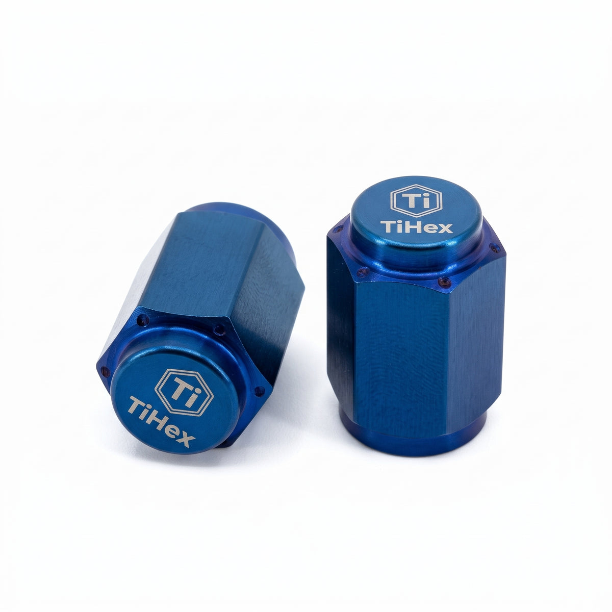 Blauwe TiHex titanium ventieldoppen